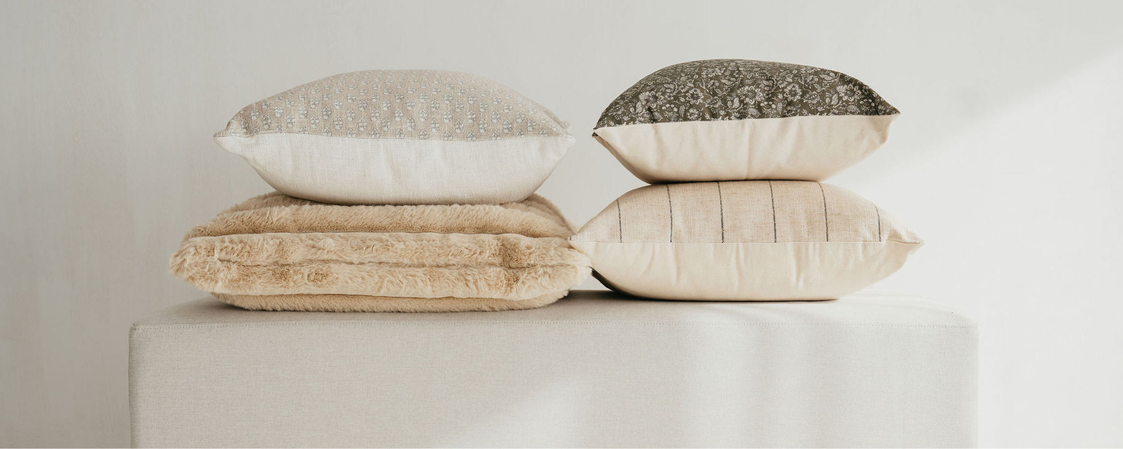 Textiles and pillows on display